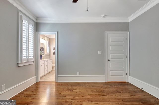 46 Horseshoe Bend Way, Senoia, GA 30276 - unfurnished room featuring crown molding, a ceiling fan, light wood-style floors, a smoke detector, and baseboards