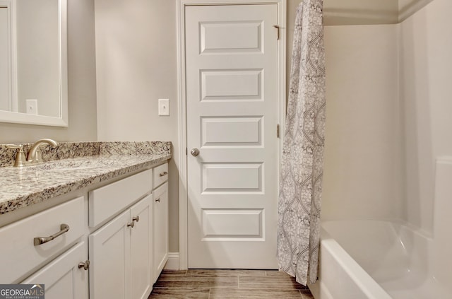 46 Horseshoe Bend Way, Senoia, GA 30276 - bathroom featuring vanity, wood finished floors, and shower / bath combination with curtain