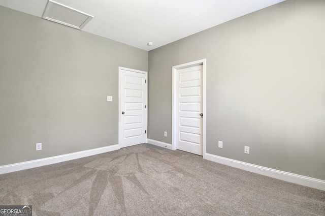 46 Horseshoe Bend Way, Senoia, GA 30276 - carpeted spare room featuring attic access and baseboards