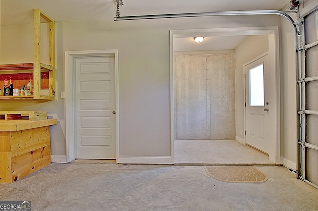 46 Horseshoe Bend Way, Senoia, GA 30276 - garage featuring baseboards