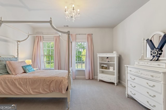15626 Birmingham Hwy, Alpharetta, GA 30004 - bedroom with light carpet and a chandelier