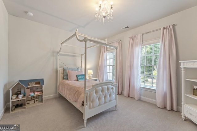 15626 Birmingham Hwy, Alpharetta, GA 30004 - carpeted bedroom featuring baseboards and a chandelier