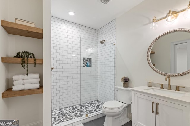 15626 Birmingham Hwy, Alpharetta, GA 30004 - bathroom featuring a tile shower, vanity, and recessed lighting