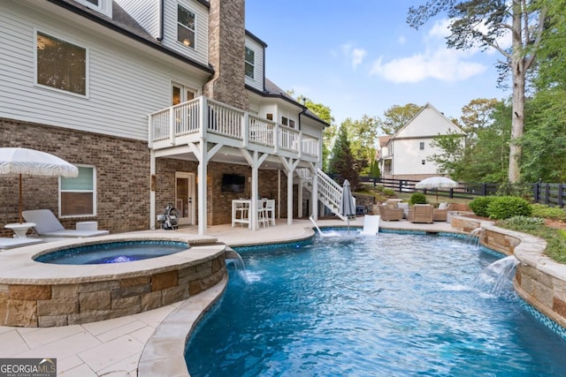 15626 Birmingham Hwy, Alpharetta, GA 30004 - view of swimming pool featuring a fenced backyard, a patio area, stairway, a pool with connected hot tub, and an outdoor living space