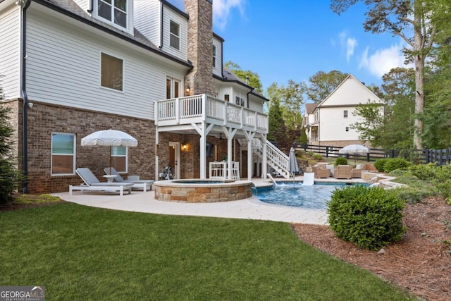 15626 Birmingham Hwy, Alpharetta, GA 30004 - back of house featuring a chimney, stairway, a pool with connected hot tub, and a patio area
