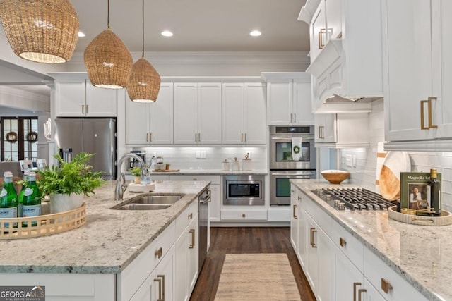 15626 Birmingham Hwy, Alpharetta, GA 30004 - kitchen with appliances with stainless steel finishes, white cabinets, backsplash, ornamental molding, and recessed lighting