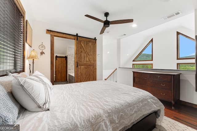 457 Monroe Ridge Rd, Sautee Nacoochee, GA 30571 - bedroom featuring a barn door, dark wood-type flooring, a ceiling fan, and recessed lighting