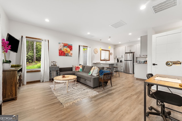 457 Monroe Ridge Rd, Sautee Nacoochee, GA 30571 - living room featuring light wood-type flooring, recessed lighting, and baseboards