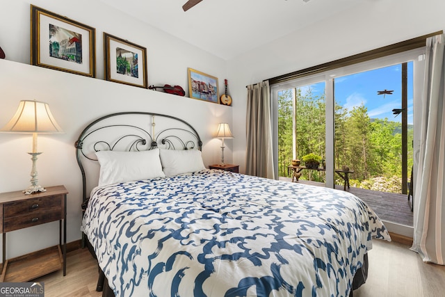 457 Monroe Ridge Rd, Sautee Nacoochee, GA 30571 - bedroom featuring wood finished floors, baseboards, and ceiling fan