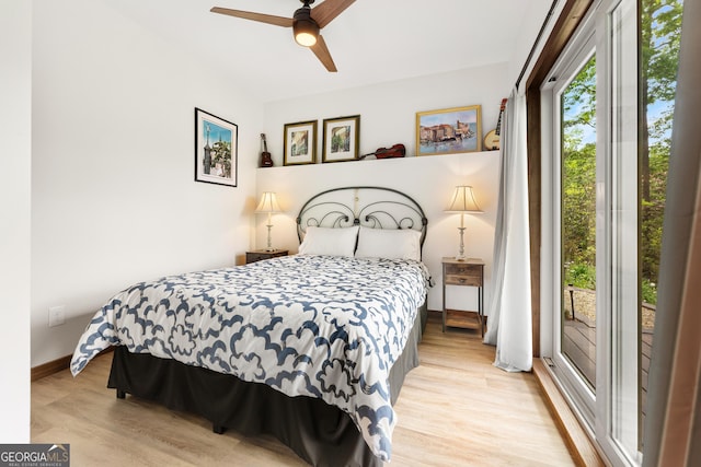457 Monroe Ridge Rd, Sautee Nacoochee, GA 30571 - bedroom featuring wood finished floors, baseboards, access to exterior, and a ceiling fan