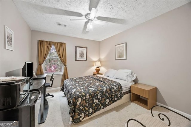 244 Timber Creek Ln, Marietta, GA 30060 - carpeted bedroom with a textured ceiling, a ceiling fan, and an office area