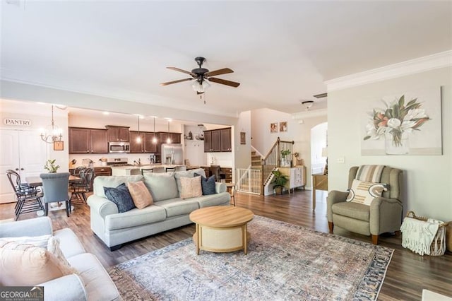 327 Nobleman Way, Canton, GA 30114 - living room with a ceiling fan, stairway, crown molding, wood finished floors, and arched walkways