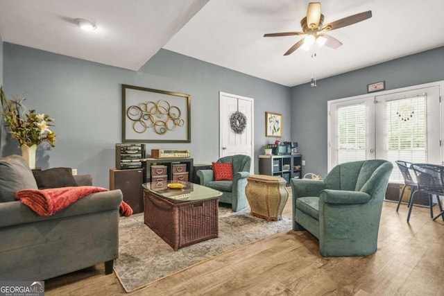 2959 Pritchards Mill Trl, Douglasville, GA 30135 - living room featuring a ceiling fan and wood finished floors