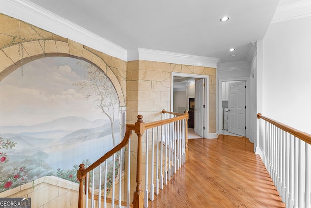 160 Torrey Pines Ct, Newnan, GA 30265 - hall featuring crown molding, washer / clothes dryer, wood finished floors, an upstairs landing, and recessed lighting