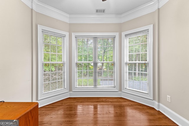 160 Torrey Pines Ct, Newnan, GA 30265 - empty room with ornamental molding, wood finished floors, baseboards, and ceiling fan