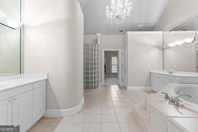 160 Torrey Pines Ct, Newnan, GA 30265 - full bathroom featuring two vanities, baseboards, a garden tub, a chandelier, and tile patterned flooring