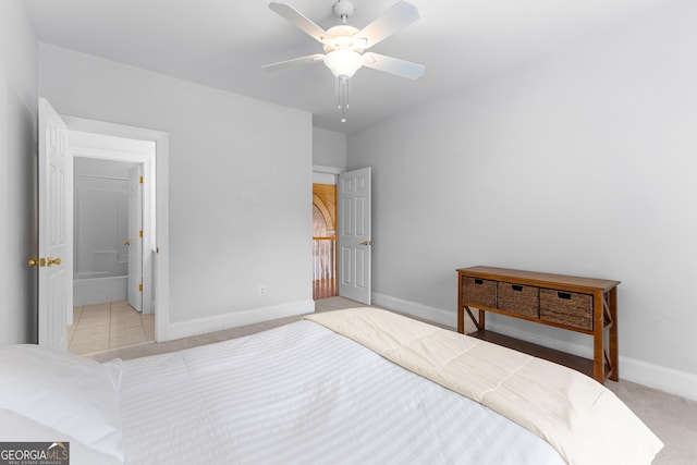 160 Torrey Pines Ct, Newnan, GA 30265 - bedroom with baseboards, a ceiling fan, and ensuite bath