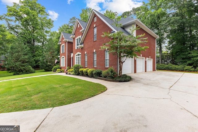 160 Torrey Pines Ct, Newnan, GA 30265 - view of home's exterior with brick siding, an attached garage, driveway, and a yard