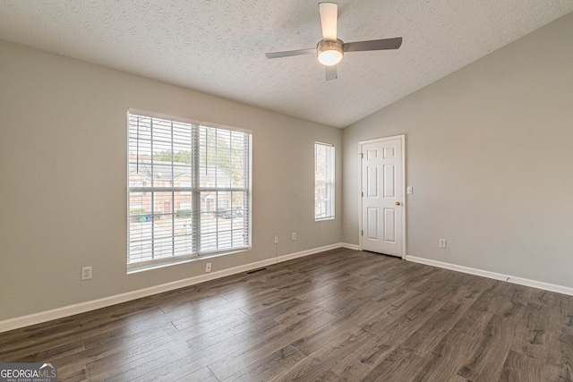 3151 Kingswood Gln, Decatur, GA 30034 - unfurnished room with a textured ceiling, a ceiling fan, dark wood-style floors, vaulted ceiling, and baseboards