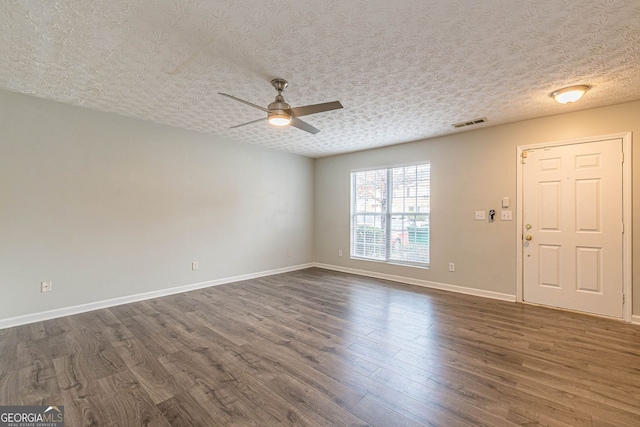 3151 Kingswood Gln, Decatur, GA 30034 - unfurnished room with a ceiling fan, dark wood-style flooring, a textured ceiling, and baseboards