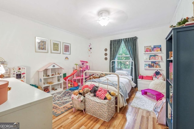 4442 Mclain Cir, Acworth, GA 30101 - bedroom with crown molding and light wood-style flooring