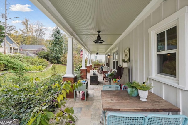 4442 Mclain Cir, Acworth, GA 30101 - porch with a ceiling fan, outdoor lounge area, and outdoor dining space