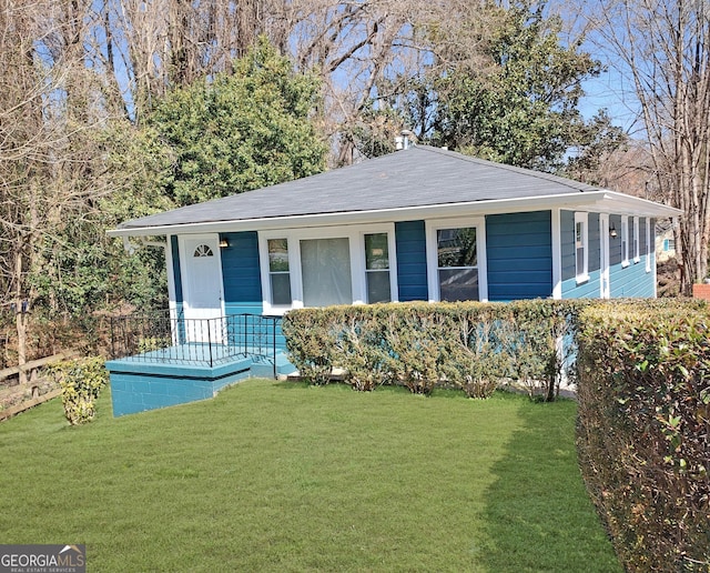 81 Burbank Dr NW, Atlanta, GA 30314 - bungalow with a front lawn and roof with shingles