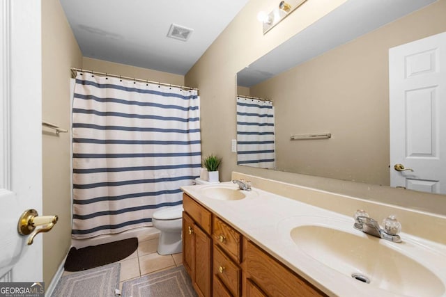1536 Fenmore St, Lithia Springs, GA 30122 - full bathroom featuring double vanity, tile patterned flooring, and curtained shower