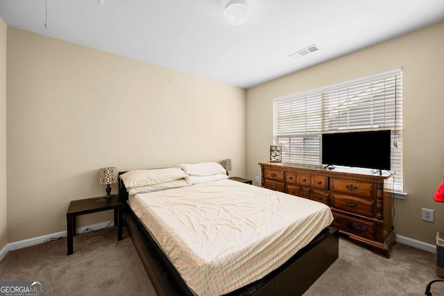 1536 Fenmore St, Lithia Springs, GA 30122 - carpeted bedroom featuring baseboards