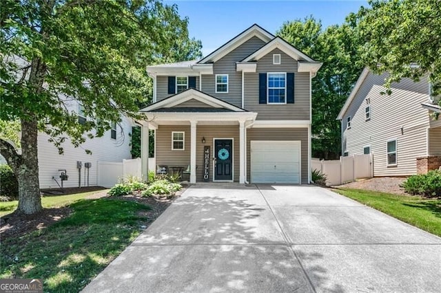 130 Nacoochee Way, Canton, GA 30114 - view of front facade with driveway, a porch, and a garage