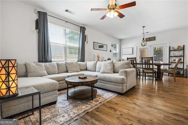 130 Nacoochee Way, Canton, GA 30114 - living room featuring wood finished floors, ceiling fan, and healthy amount of natural light