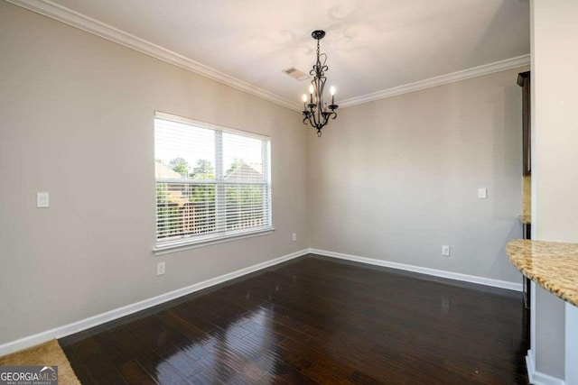 1021 Reddy Farm Rd, Grayson, GA 30017 - unfurnished dining area with a chandelier, dark wood-style floors, and crown molding