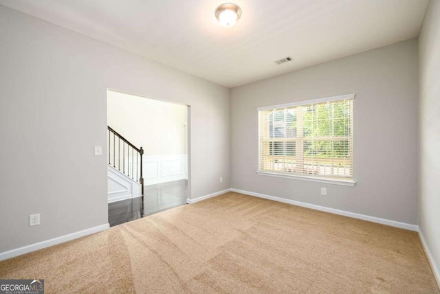 1021 Reddy Farm Rd, Grayson, GA 30017 - unfurnished room featuring carpet and stairs