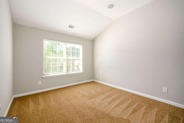 1021 Reddy Farm Rd, Grayson, GA 30017 - carpeted empty room with baseboards and lofted ceiling