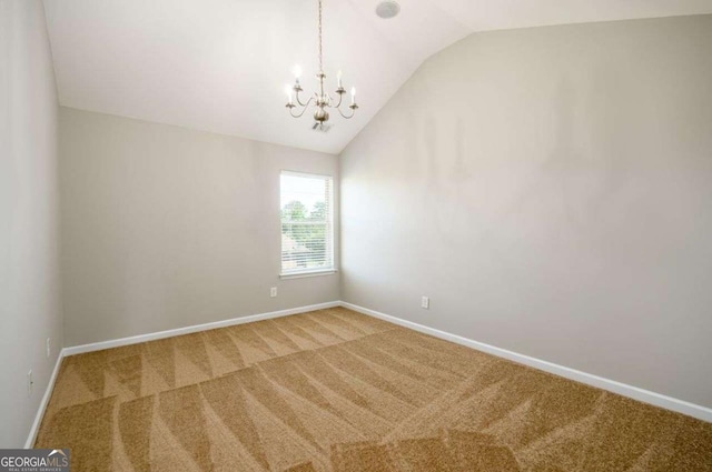 1021 Reddy Farm Rd, Grayson, GA 30017 - unfurnished room featuring lofted ceiling, carpet flooring, and a chandelier