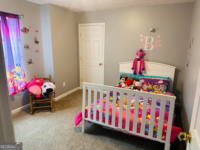 789 Winbrook Dr Unit 1, Mcdonough, GA 30253 - carpeted bedroom featuring baseboards