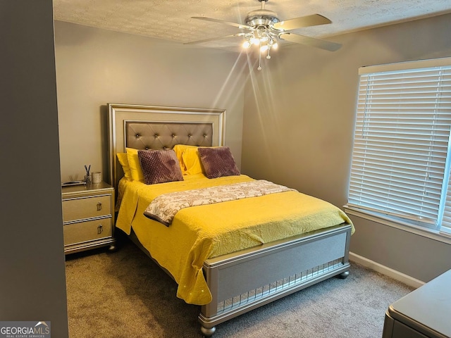 789 Winbrook Dr Unit 1, Mcdonough, GA 30253 - carpeted bedroom featuring a textured ceiling and a ceiling fan