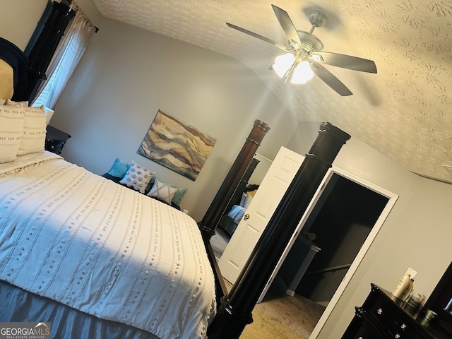 789 Winbrook Dr Unit 1, Mcdonough, GA 30253 - carpeted bedroom with a textured ceiling, ceiling fan, and vaulted ceiling