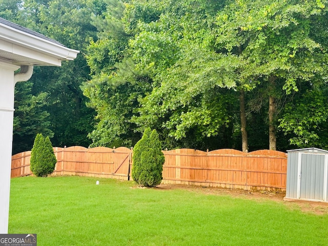 789 Winbrook Dr Unit 1, Mcdonough, GA 30253 - fenced backyard featuring a storage unit
