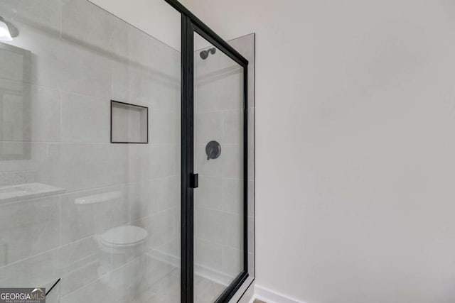 560 Coots Lake Rd, Rockmart, GA 30153 - bathroom featuring a stall shower and toilet