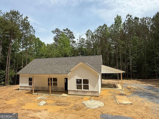 560 Coots Lake Rd, Rockmart, GA 30153 - view of front facade with a shingled roof and a forest view