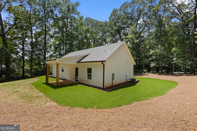 560 Coots Lake Rd, Rockmart, GA 30153 - rear view of house with roof with shingles and a lawn