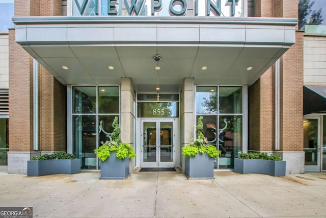 855 Peachtree St NE Unit 1703, Atlanta, GA 30308 - property entrance with brick siding and french doors