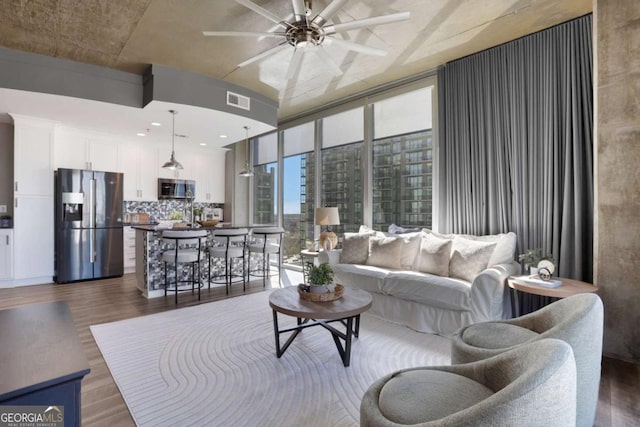 855 Peachtree St NE Unit 1703, Atlanta, GA 30308 - living area featuring dark wood-type flooring and ceiling fan