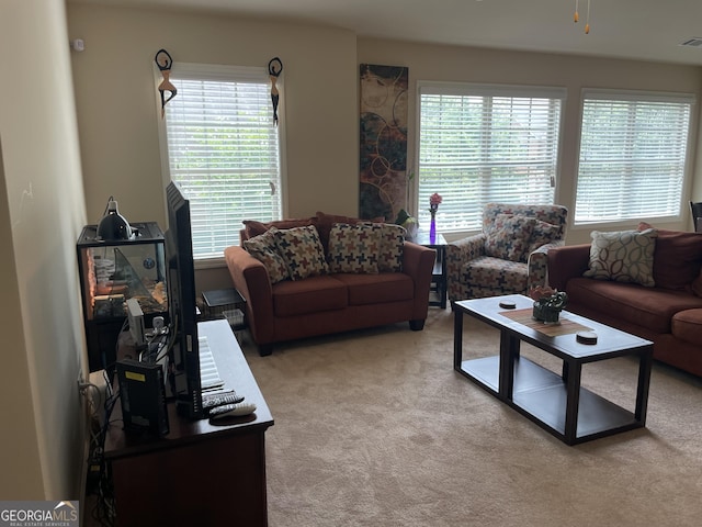 805 Pleasant Hill Rd NW Unit 53, Lilburn, GA 30047 - living area with light carpet and a ceiling fan