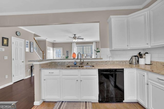 13300 Morris Rd Unit 62, Alpharetta, GA 30004 - kitchen featuring black dishwasher, a sink, a peninsula, white cabinetry, and ceiling fan