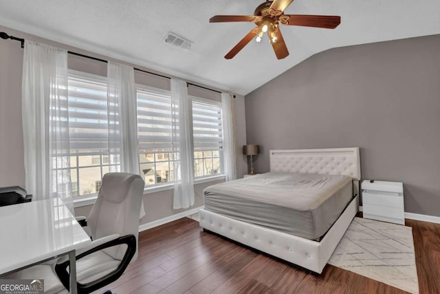 13300 Morris Rd Unit 62, Alpharetta, GA 30004 - bedroom featuring vaulted ceiling, baseboards, wood finished floors, and ceiling fan
