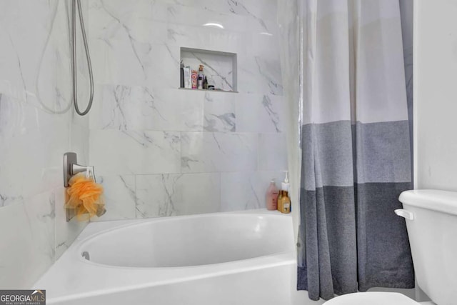 13300 Morris Rd Unit 62, Alpharetta, GA 30004 - bathroom featuring toilet and shower / tub combo with curtain