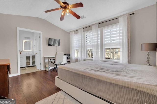 13300 Morris Rd Unit 62, Alpharetta, GA 30004 - bedroom featuring vaulted ceiling, dark wood finished floors, baseboards, a ceiling fan, and ensuite bath
