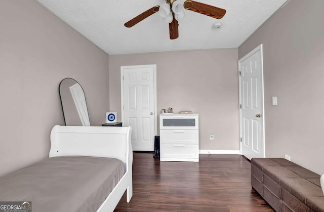 13300 Morris Rd Unit 62, Alpharetta, GA 30004 - bedroom featuring dark wood-type flooring, baseboards, and a ceiling fan